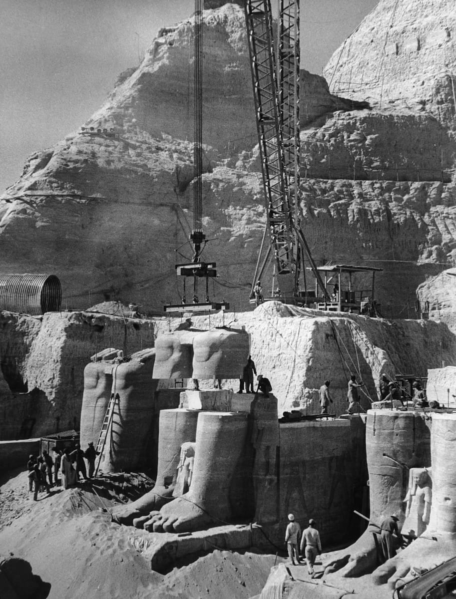 The 1960s rescue in progress: the face of one of the colossi being cut free and lifted during the UNESCO campaign to move the temples above the rising reservoir.