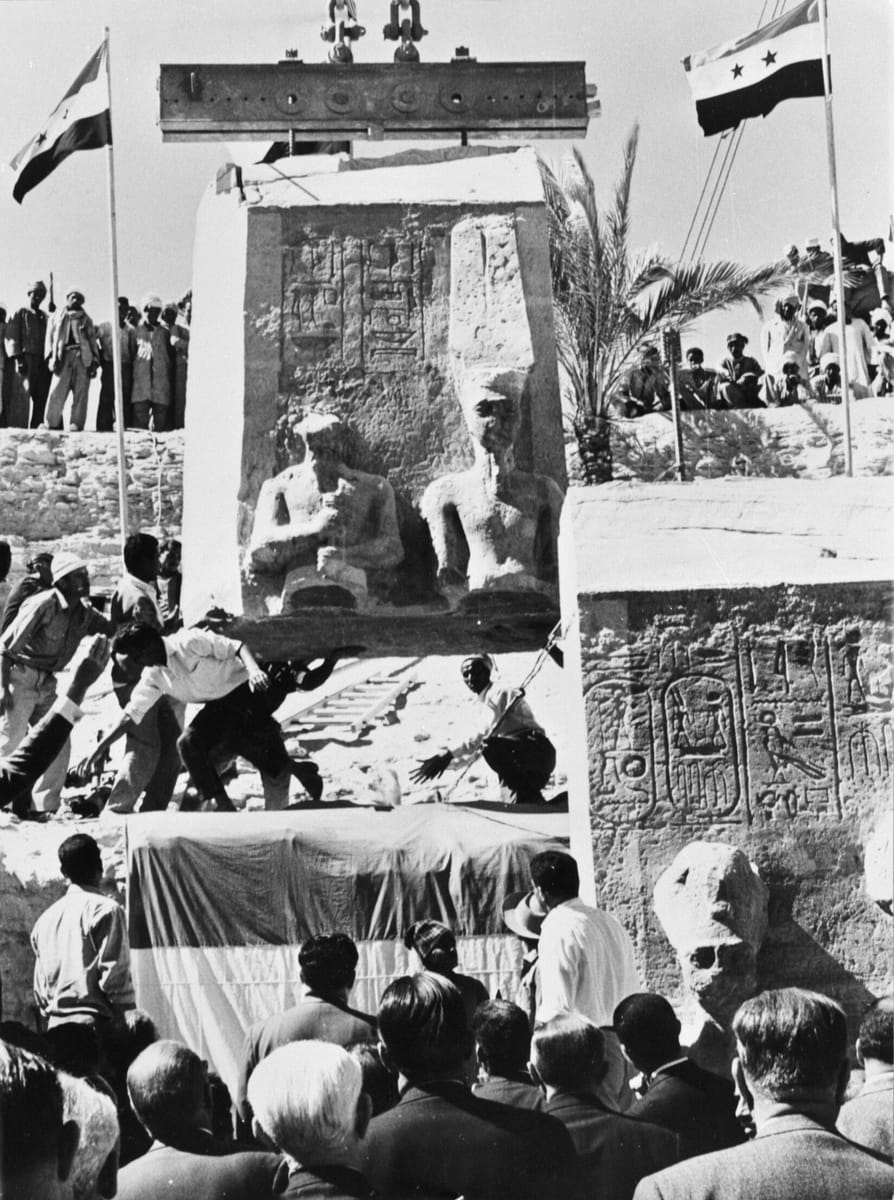 Reassembly at the new, higher site, where the numbered sandstone blocks were fitted back together inside an artificial hill supported by a concrete dome (1966).
