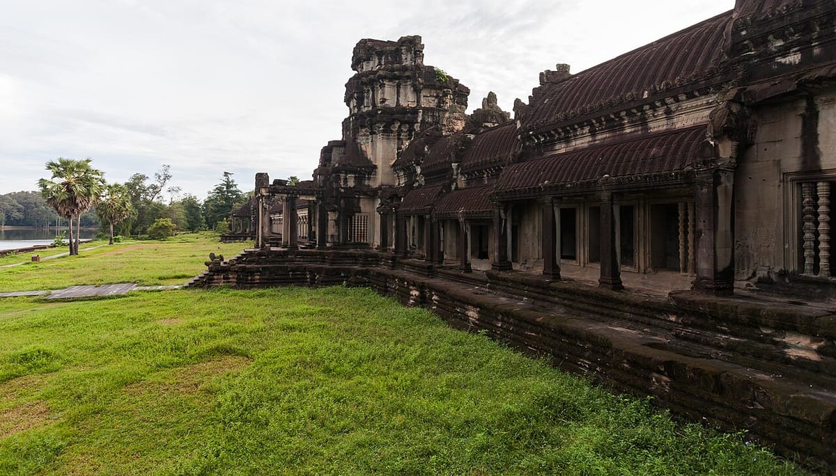 The outer gallery of Angkor Wat, its sandstone colonnades and corbelled roofline running the length of the temple's third enclosure.