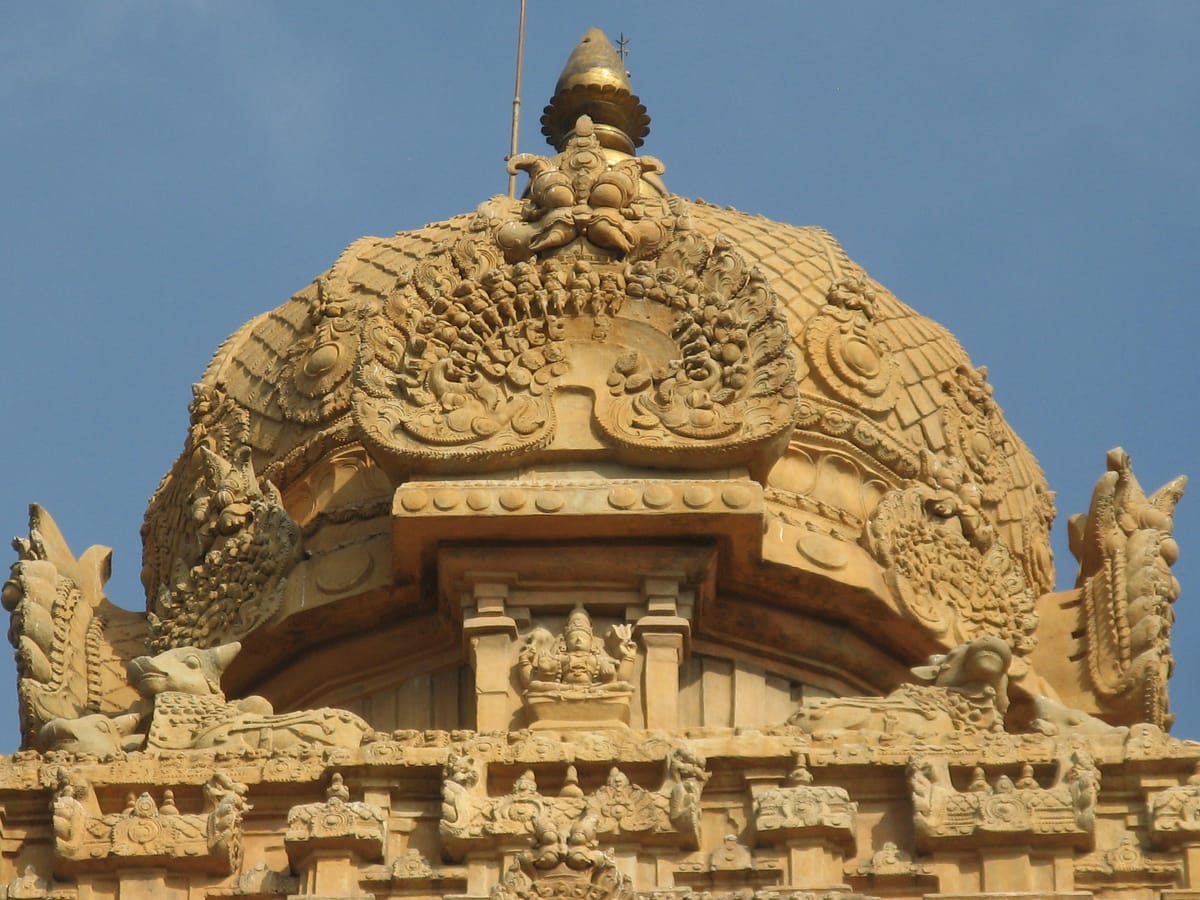 The sikhara at the summit of the vimana — the domed crowning element set atop the great granite capstone roughly 60 metres above the ground.