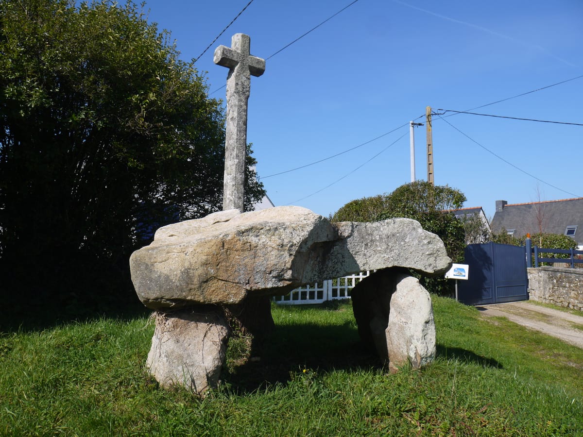 The dolmen of Cruz-Menquen near Carnac, a megalithic tomb later topped with a Christian cross.