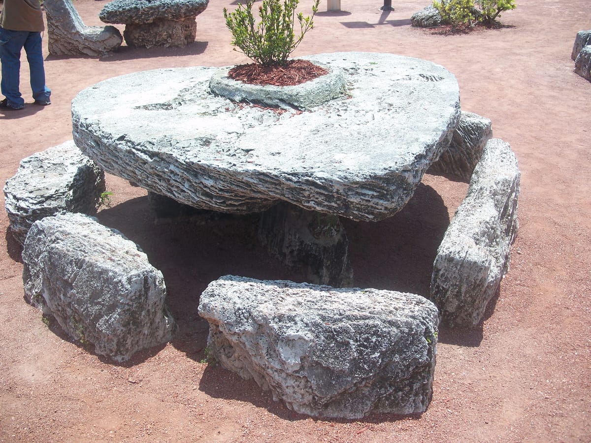A heart-shaped table carved from a single block of oolitic limestone, one of many furniture pieces Leedskalnin cut in place.