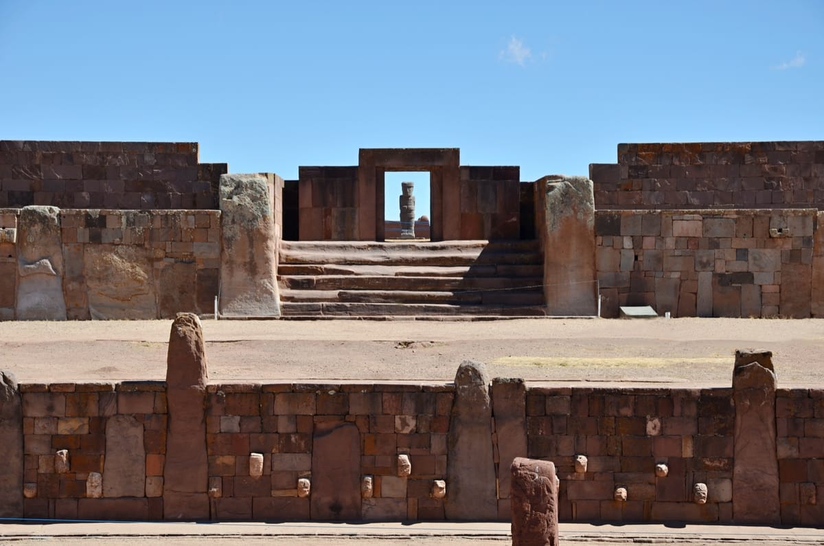The Kalasasaya platform with the Ponce Monolith standing in its courtyard, aligned to the enclosure's eastern gateway.