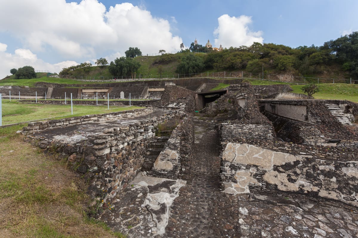 The Patio de los Altares on the south side — one of the few parts of the complex that has been excavated and left exposed rather than tunnelled through.