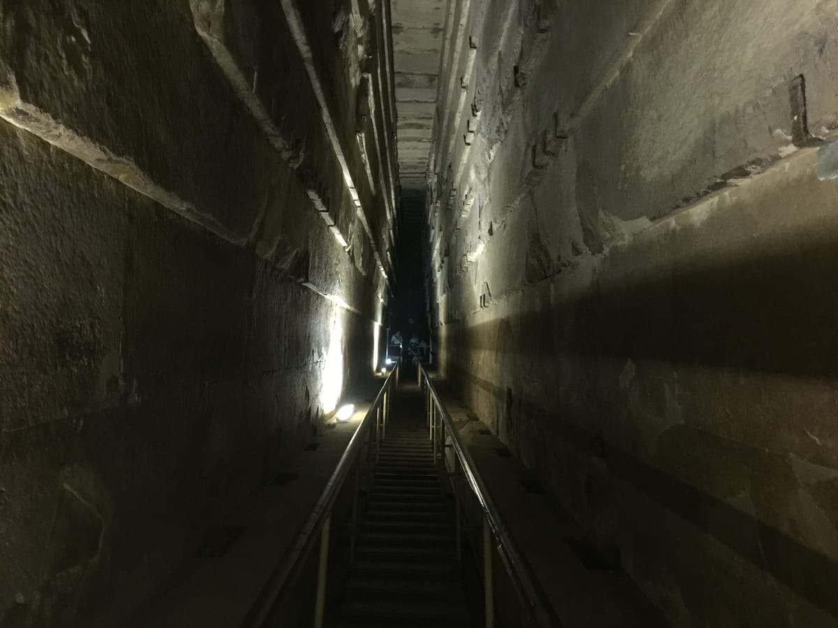 The Grand Gallery, a soaring corbelled passage that rises toward the King's Chamber.