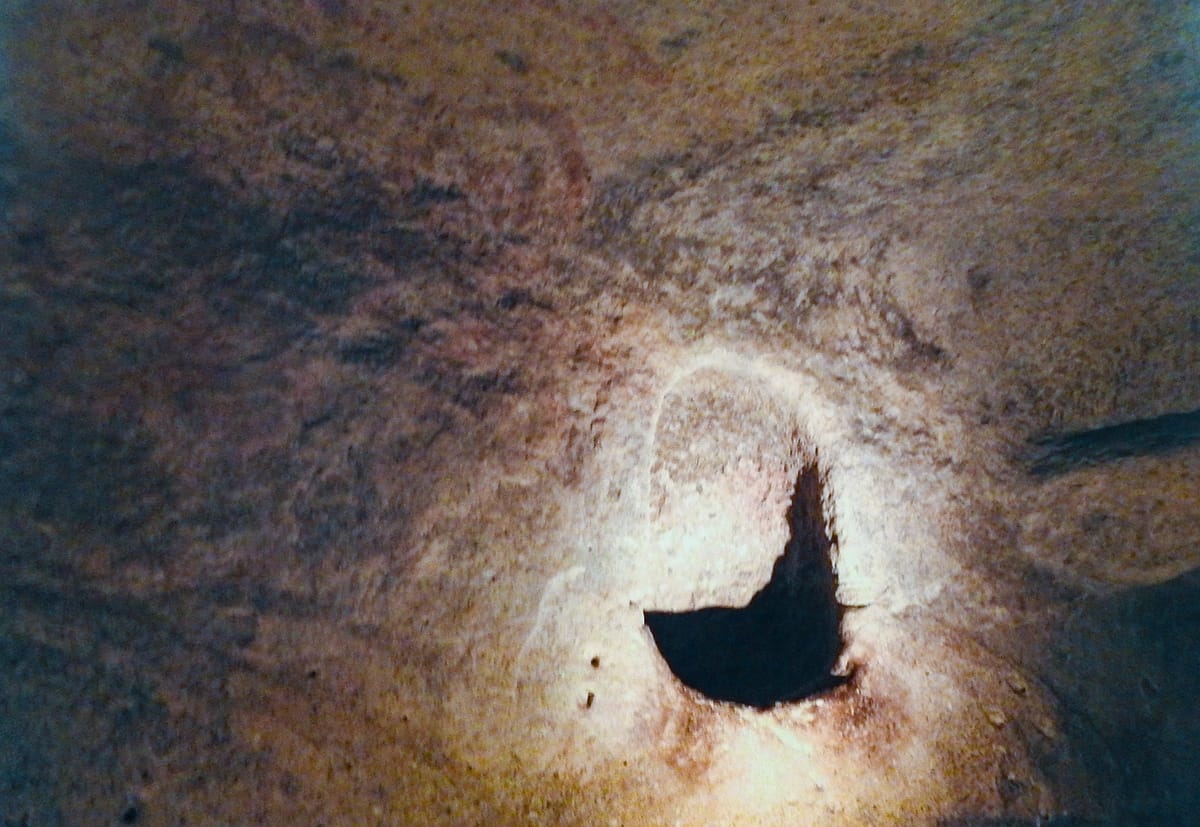 The 'Oracle Hole', a small carved niche in the Oracle Chamber associated with the room's unusual acoustic resonance.