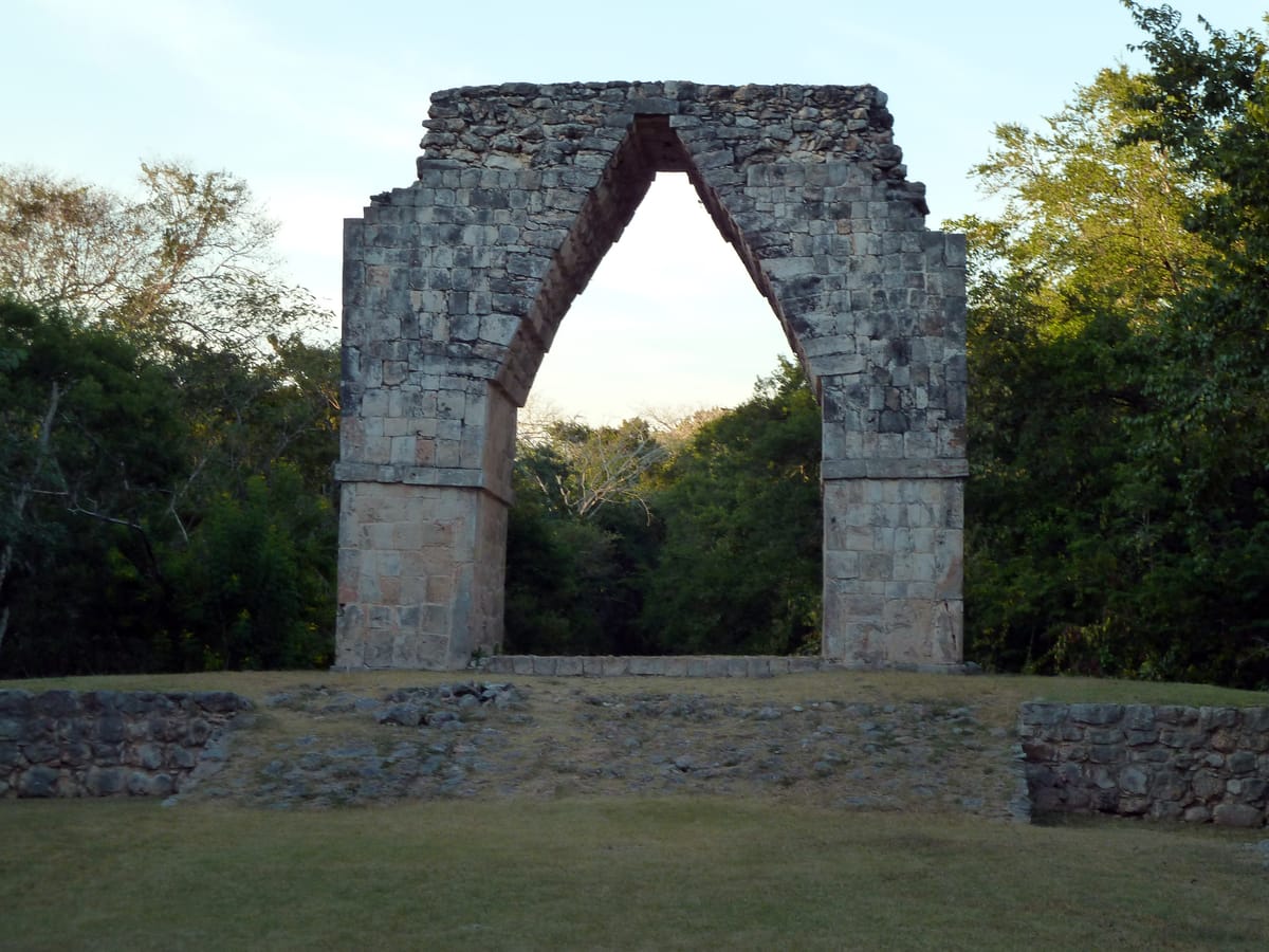 The corbelled Arch of Kabah, the monumental gateway standing at the Kabah end of the raised causeway that ran to Uxmal.