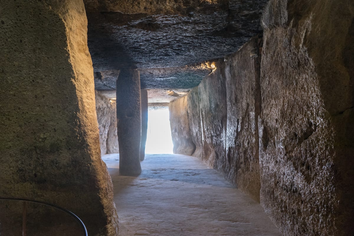 Interior of the Menga chamber, showing the orthostats and massive capstones overhead.