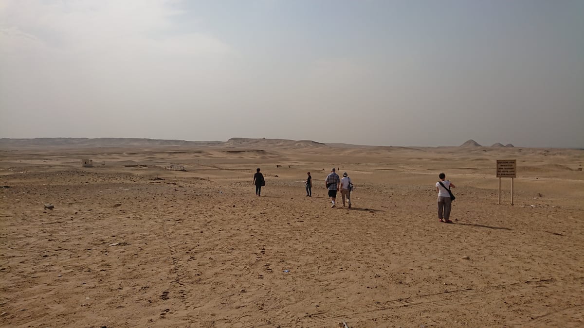 The approach to the Serapeum entrance at Saqqara, where a sphinx-lined avenue once led visitors toward the underground vaults.