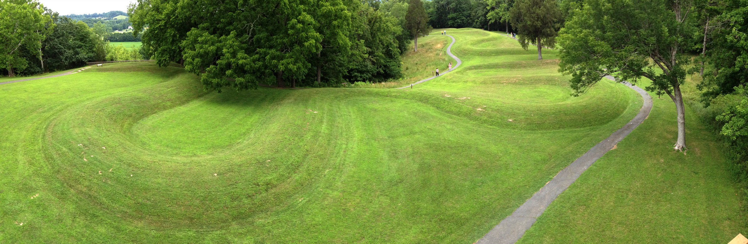 Panorama from the observation tower at Serpent Mound; the coiled tail is at left and the head lies in the distance at right.