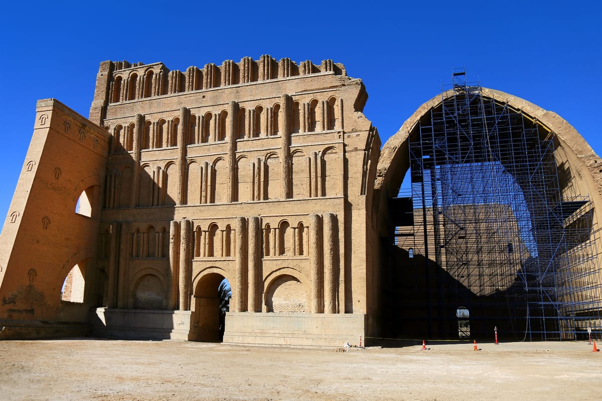 The facade close up, showing the tiers of blind arcading and engaged columns that decorated the front of the audience hall, and the sheared edge where the rest of the wall has gone.