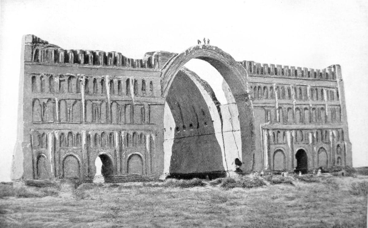 Ctesiphon photographed in 1864, with both wings of the facade still standing either side of the arch — the northern wing at right came down in the flood of 1888.