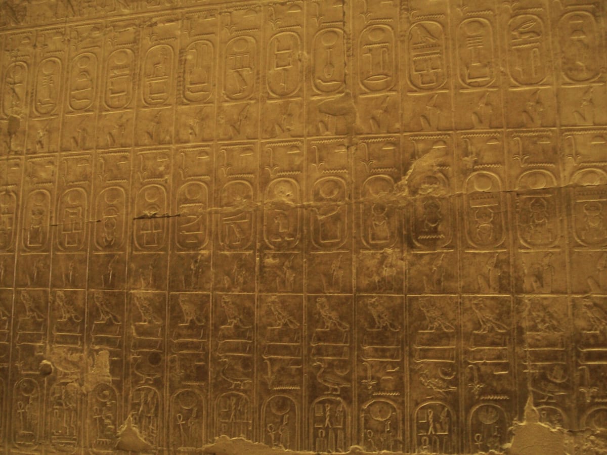 The Abydos King List: rows of cartouches naming 76 pharaohs, carved under Ramesses II and a key source for Egyptian chronology despite its deliberate omissions.