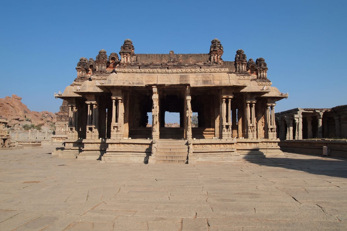The maha mantapa on its moulded plinth, the most ornate hall of the complex and the pinnacle of Vijayanagara temple architecture.